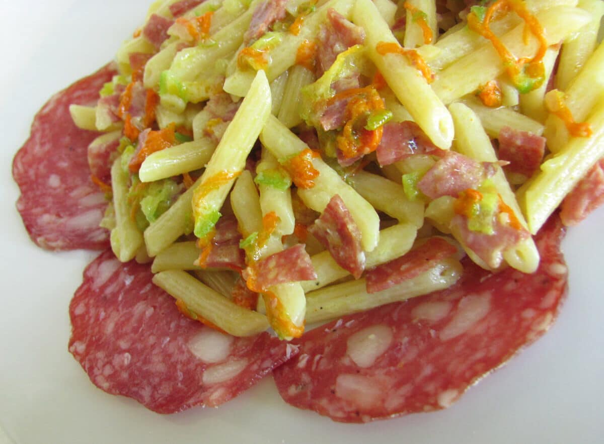 pasta with squash blossoms and salami