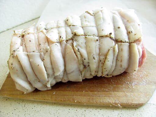 Pork loin covered with slices of lard